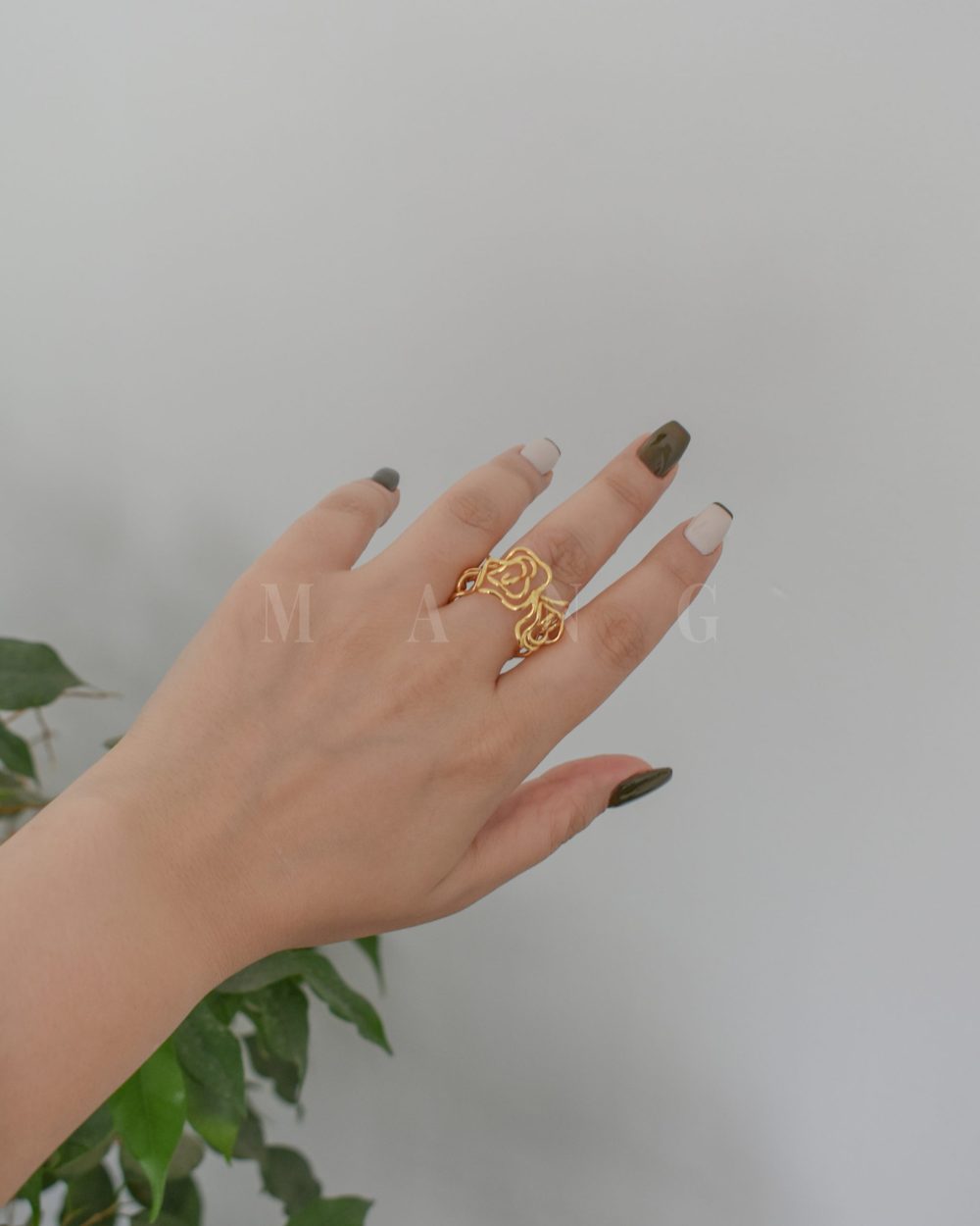 انگشتر گل فنری