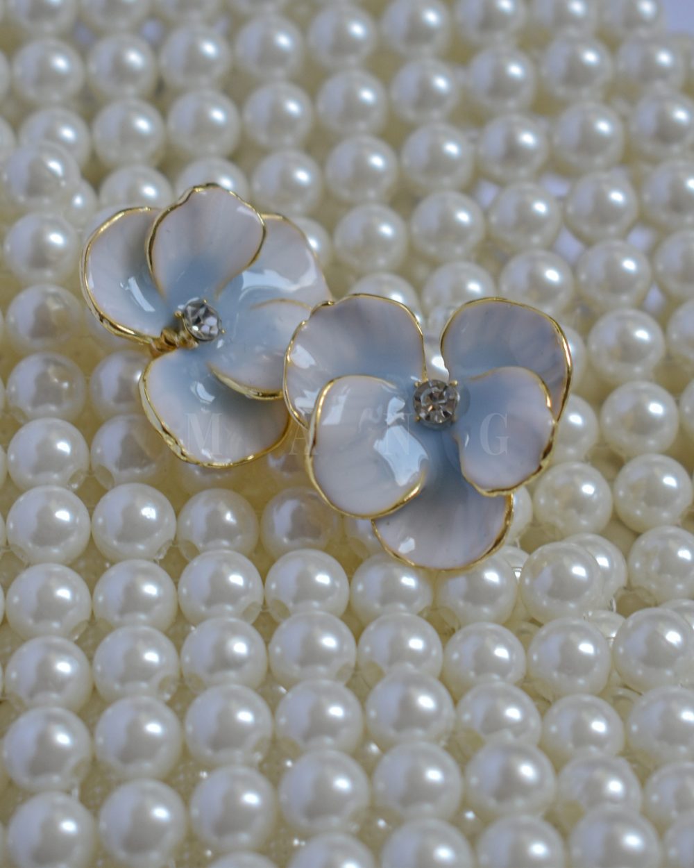 گوشواره میناکاری طرح گل آبی