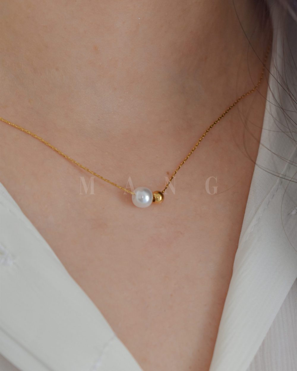 گردنبند طرح گوی و مروارید