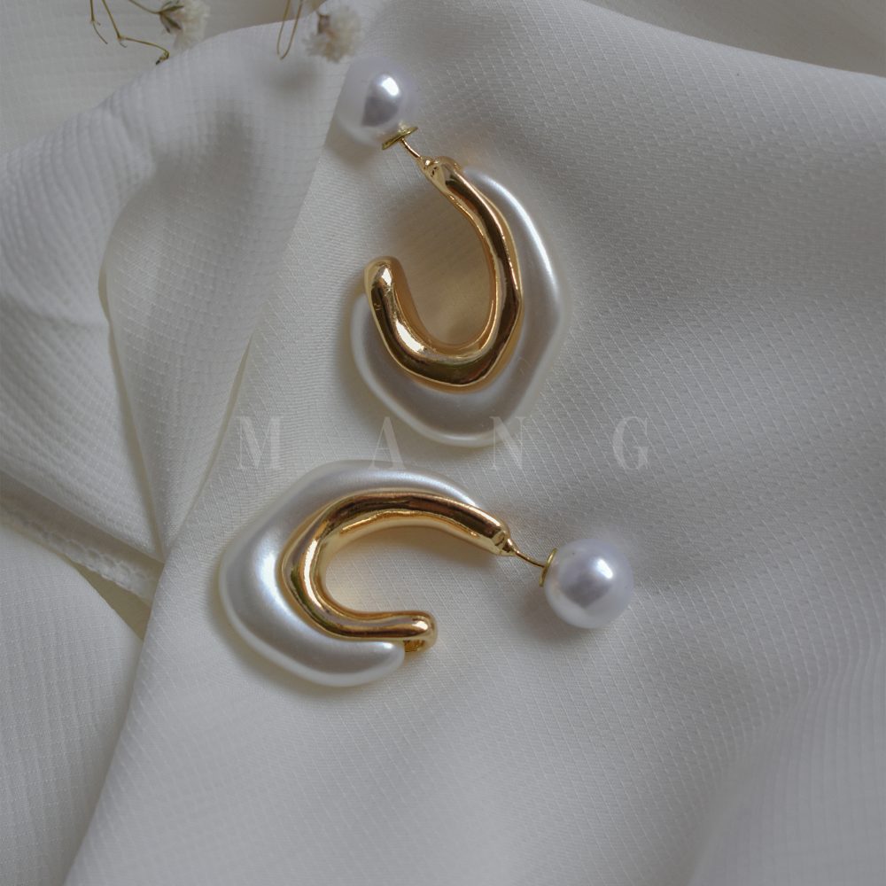 گوشواره صدفی دفرمه