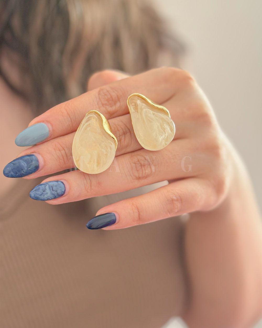 گوشواره دفرمه طلایی