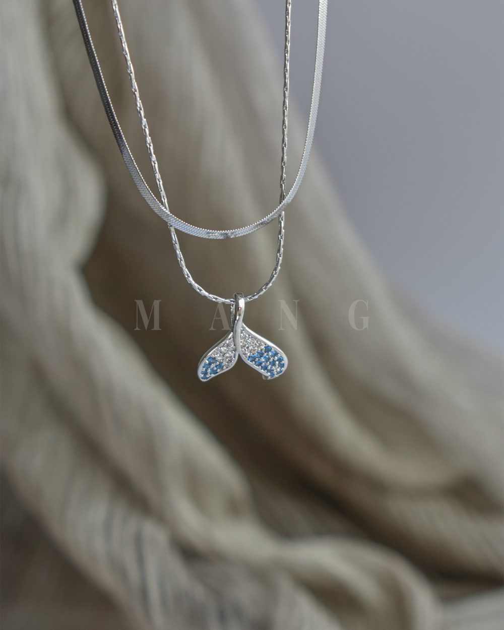 گردنبند طرح وال فیروزه‌ای